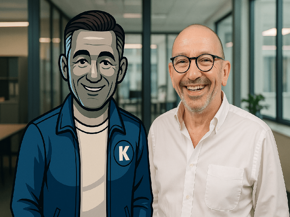 Michael and Norman standing side by side in the KickstartSEO office — representing our approach to service and teamwork: human expertise with AI strategy.